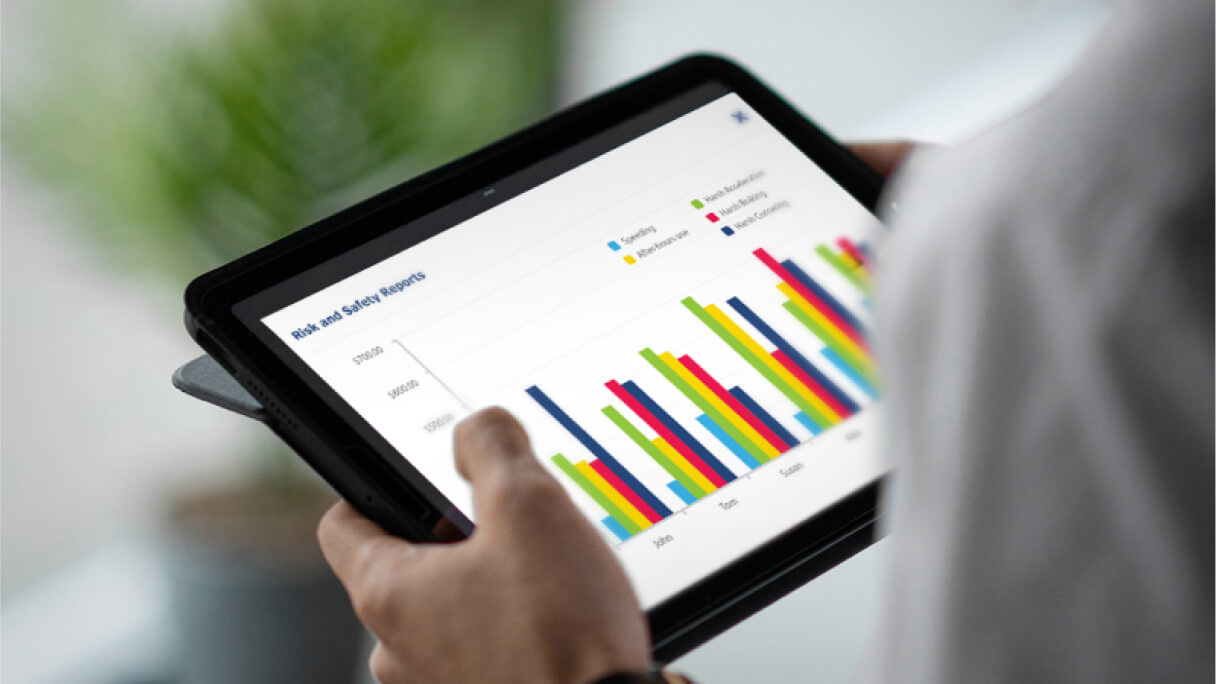 Technician checking inventory shelf, illustrating predictive maintenance support for fleet uptime