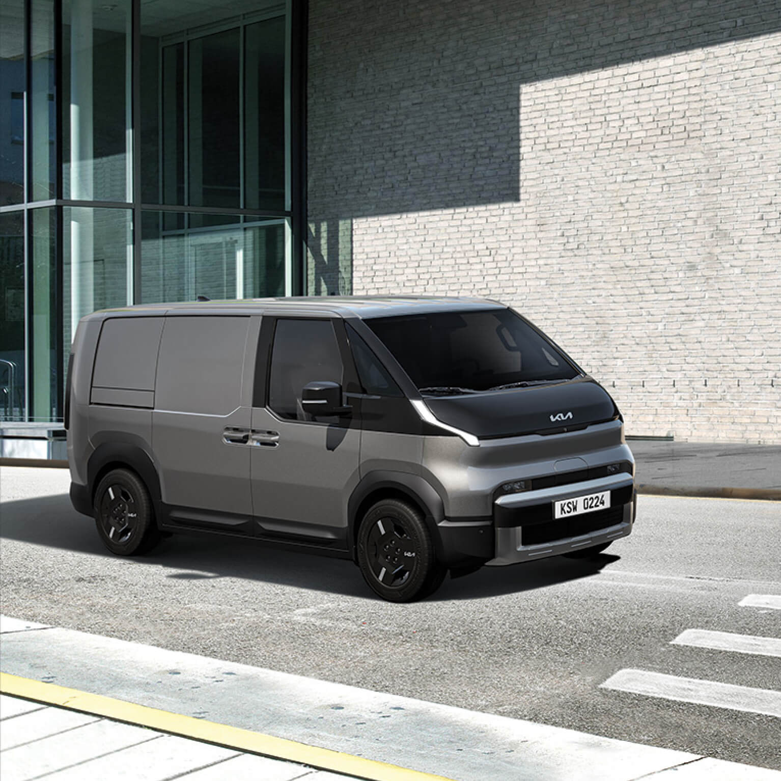 Side-front view of the Kia PV5 Cargo in city crosswalk scene highlighting safety features