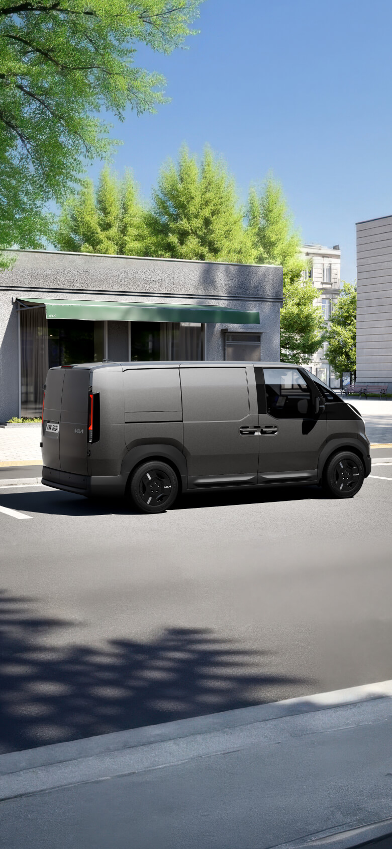 Rear-side view of the Kia PV5 Cargo Long highlighting full-swing rear doors and low step height for loading