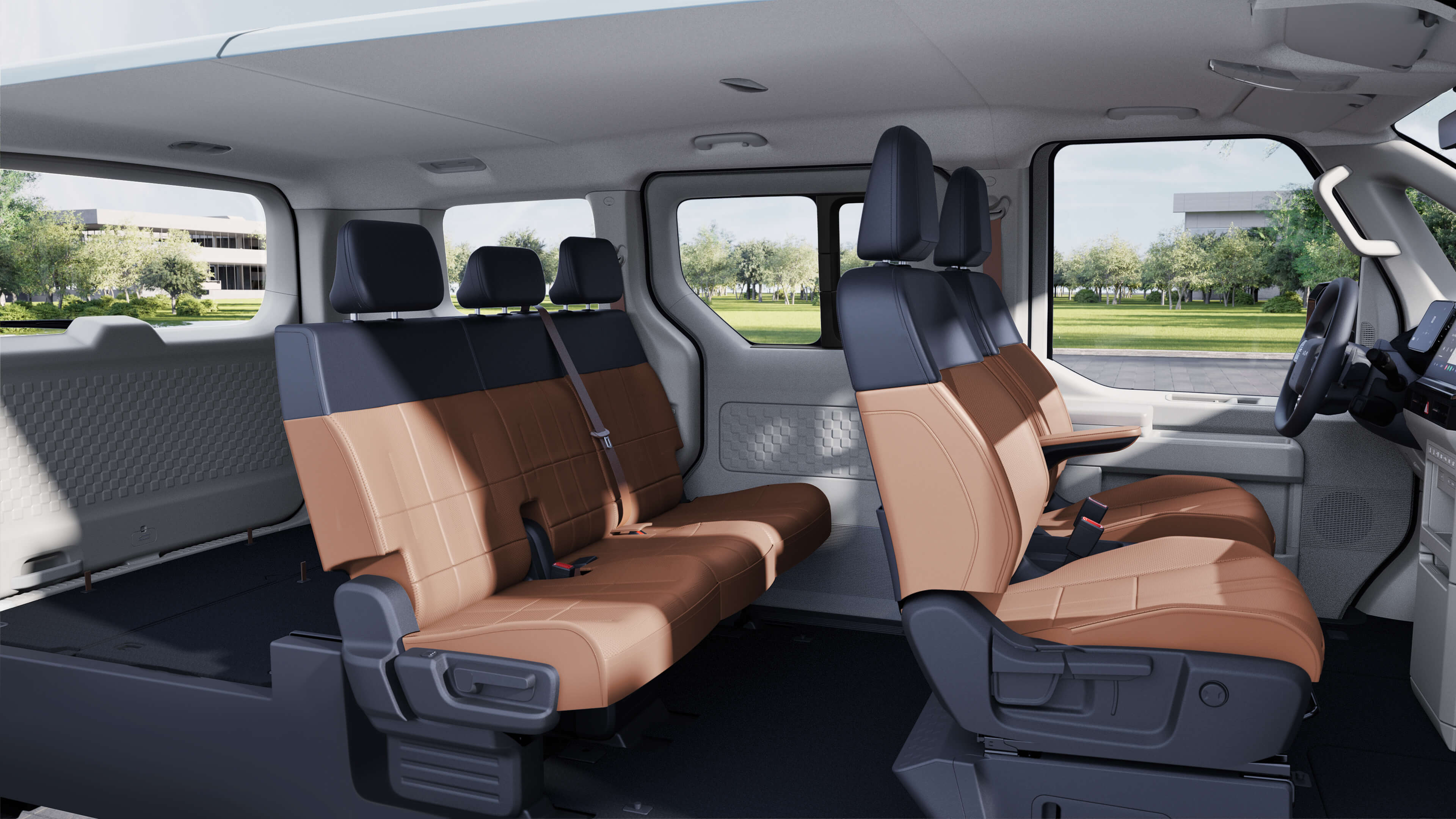 Interior side view of the the Kia PV5 Passenger with flexible seating configuration